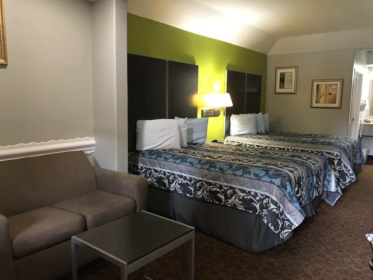 Camelot Inn And Suites Aldine Buitenkant foto
