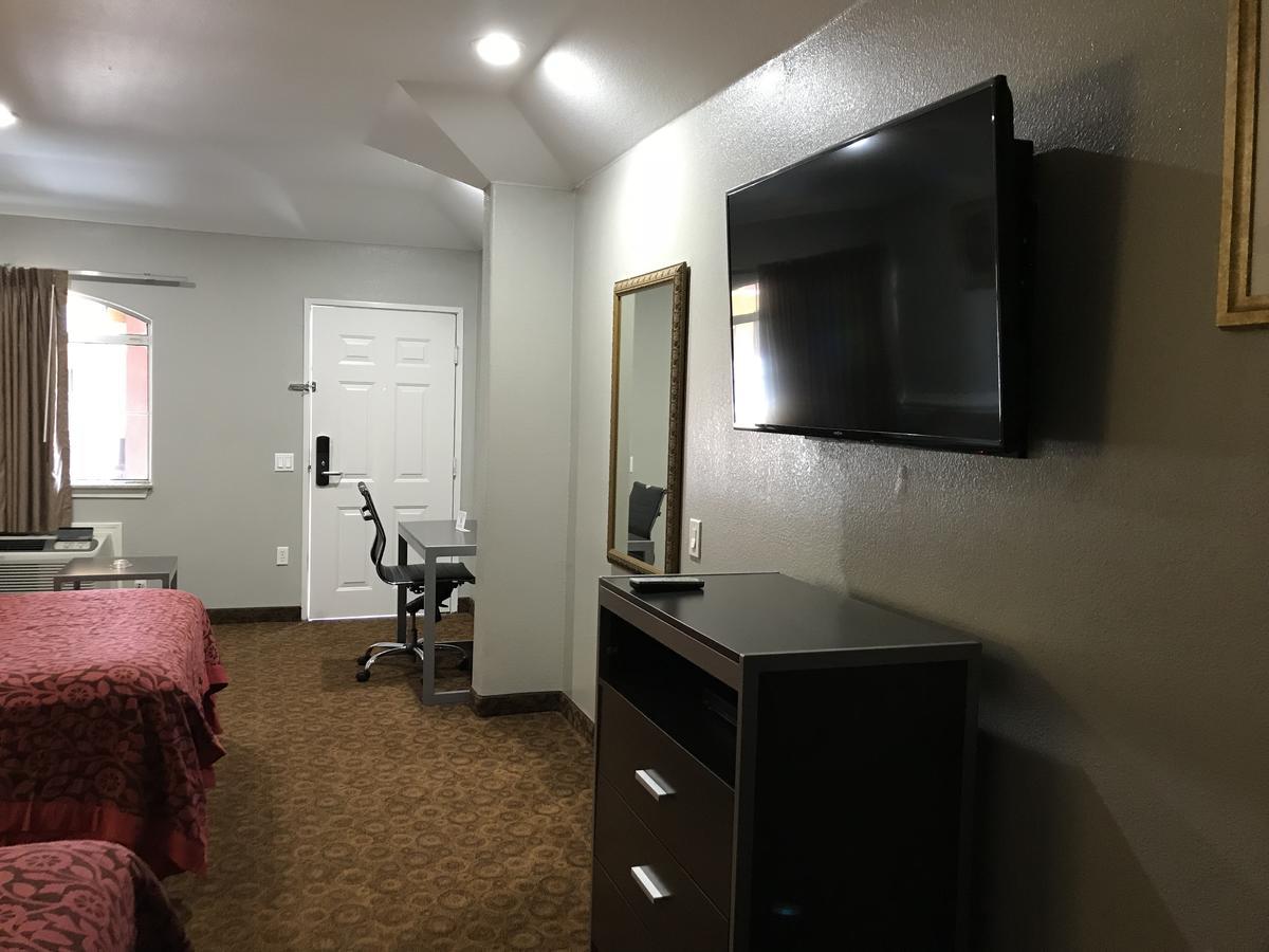 Camelot Inn And Suites Aldine Buitenkant foto