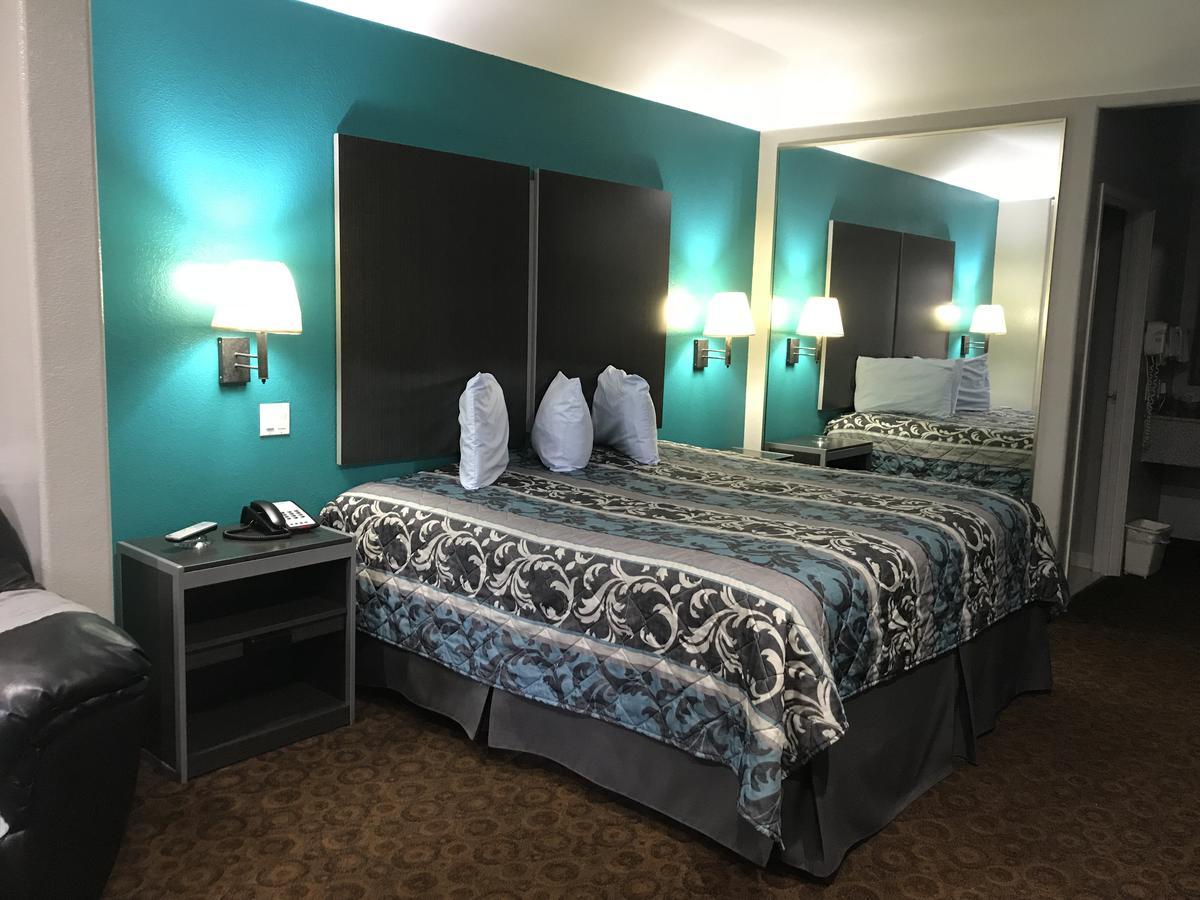 Camelot Inn And Suites Aldine Buitenkant foto
